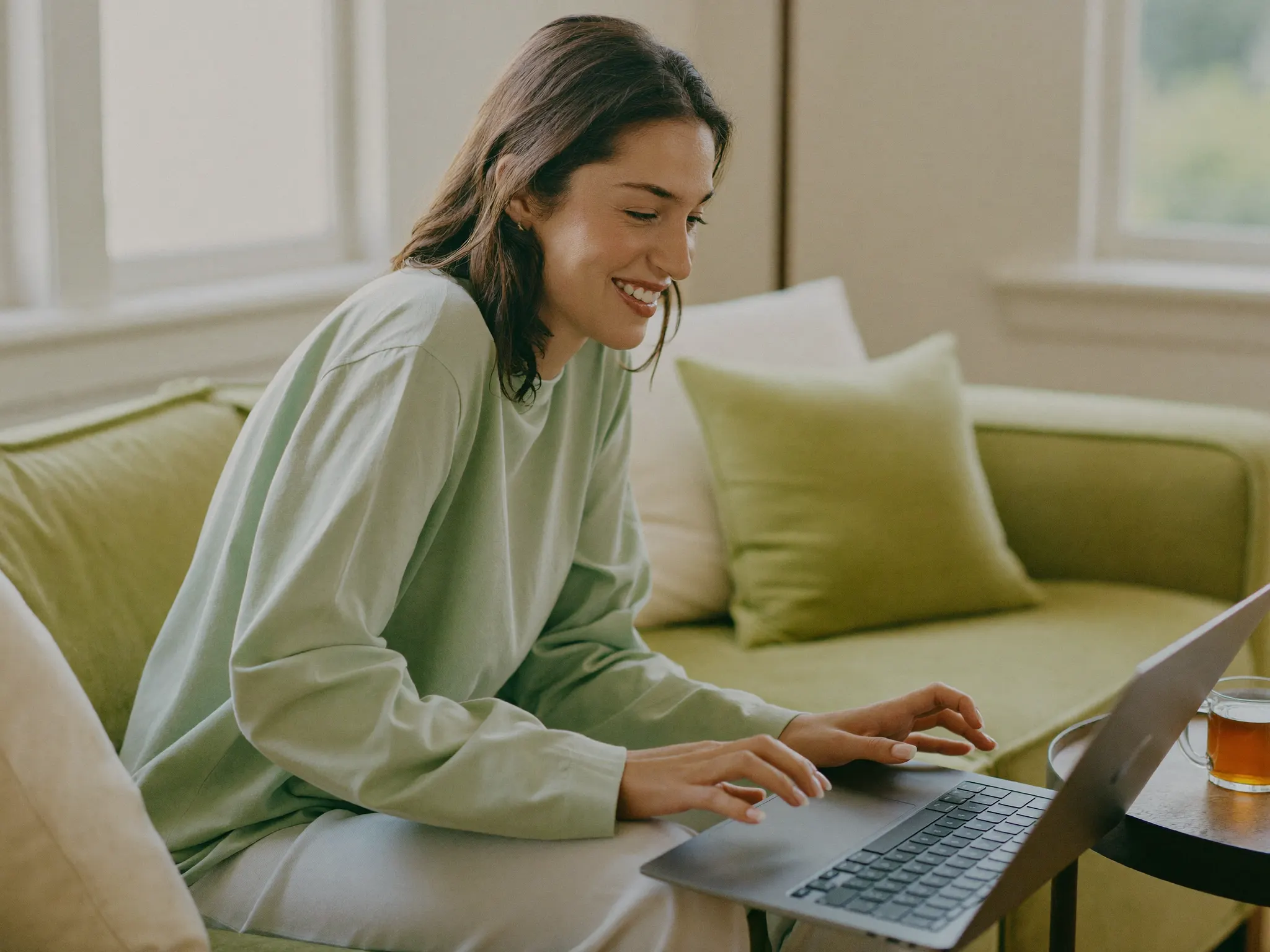 A patient having a relaxed video consultation with a GP from home